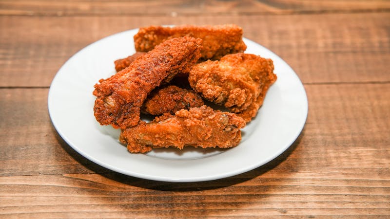Classic Buffalo Wings — crispy bone-in wings tossed in tangy buffalo sauce